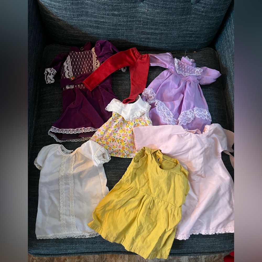 Lot of vintage 70s/80s doll clothes. Probably not haunted.
